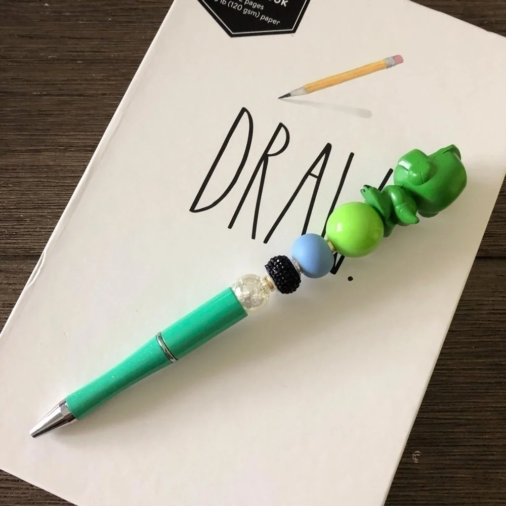 Disney Doorables: Toy Story: Rex handmade beaded pen